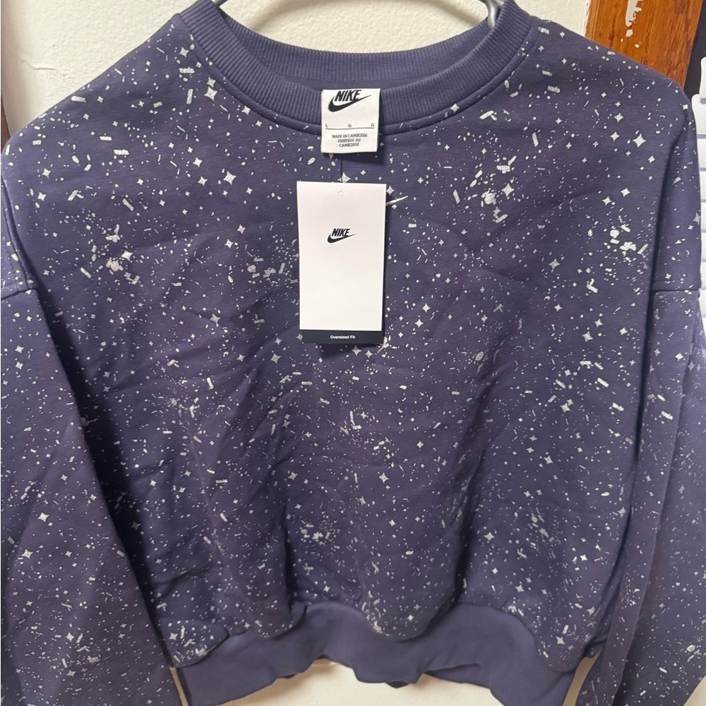 Nike Kids Purple Star Pattern Top with gray leggings to match